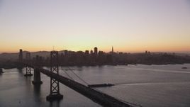 5K Aerial Video Bay Bridge and the skyline of Downtown San Francisco, California, twilight Aerial Stock Footage | DCSF07_071