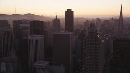 5K Aerial Video Fly over downtown to approach 555 California Street skyscraper, Downtown San Francisco, California, twilight Aerial Stock Footage | DCSF07_073