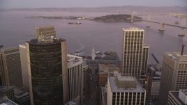 5K Aerial Video Approach and tilt to the Ferry Building and docked ferries, Downtown San Francisco, California, twilight Aerial Stock Footage | DCSF07_080