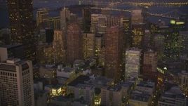 5K Aerial Video Tilt from city streets to reveal skyscrapers in Downtown San Francisco, California, night Aerial Stock Footage | DCSF07_092