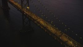 5K Aerial Video Tilt from Bay Bridge to reveal North Beach and Downtown San Francisco, California, twilight Aerial Stock Footage | DCSF07_102