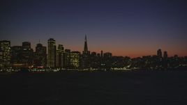 5K Aerial Video of Downtown San Francisco skyline seen from San Francisco Bay, California, night Aerial Stock Footage | DCSF07_118