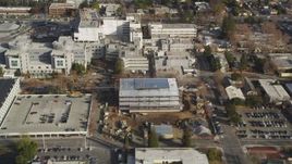 5K Aerial Video Reverse view of suburban neighborhoods, reveal Santa Clara Valley Medical Center, San Jose, California Aerial Stock Footage | DCSF09_010