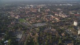5K Aerial Video Tilt from apartment buildings to reveal and approach Hoover Tower and Stanford University, Stanford, California Aerial Stock Footage | DCSF09_018