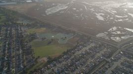 5K Aerial Video Reverse view of marshland, San Lorenzo Park, neighborhoods in San Lorenzo, California Aerial Stock Footage | DCSF09_033