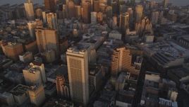 5K Aerial Video Tilt from downtown buildings to reveal and approach skyscrapers, Downtown San Francisco, California, twilight Aerial Stock Footage | DCSF10_005
