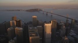 5K Aerial Video Fly over downtown to approach the Bay Bridge, San Francisco, California, twilight Aerial Stock Footage | DCSF10_007
