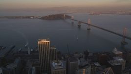 5K Aerial Video Approach the Bay Bridge from Downtown San Francisco, California, twilight Aerial Stock Footage | DCSF10_008