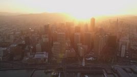 5K Aerial Video Downtown skyscrapers and the Ferry Building, San Francisco, California, sunset Aerial Stock Footage | DCSF10_009
