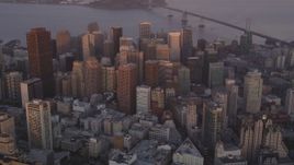 5K Aerial Video Approach and tilt to skyscrapers in Downtown San Francisco, California, sunset Aerial Stock Footage | DCSF10_018