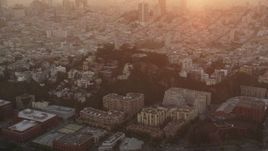 5K Aerial Video Flying by Coit Tower and North Beach apartment buildings, San Francisco, California, sunset Aerial Stock Footage | DCSF10_021