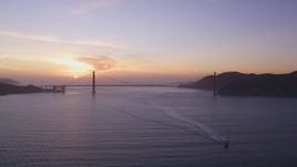 5K Aerial Video Setting sun behind the Golden Gate Bridge, San Francisco, California, sunset Aerial Stock Footage | DCSF10_025