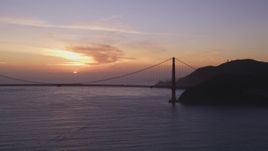 5K Aerial Video Golden Gate Bridge with setting sun in the distance, San Francisco, California, sunset Aerial Stock Footage | DCSF10_026