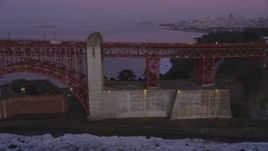 5K Aerial Video Flyby south side of the Golden Gate Bridge, downtown skyline in the background, San Francisco, California, twilight Aerial Stock Footage | DCSF10_036