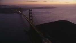 5K Aerial Video Flyby heavy traffic crossing the Golden Gate Bridge, San Francisco, California, twilight Aerial Stock Footage | DCSF10_050