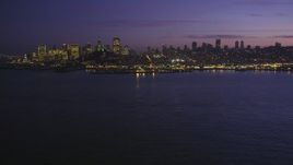 5K Aerial Video Low altitude approach to Pier 39 and skyline of Downtown San Francisco, California, twilight Aerial Stock Footage | DCSF10_060