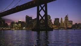 5K Aerial Video Fly under Bay Bridge near Downtown San Francisco, California, twilight Aerial Stock Footage | DCSF10_066