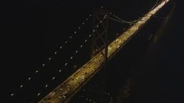 5K Aerial Video Flying by heavy traffic on the Bay Bridge, San Francisco, California, night Aerial Stock Footage | DCSF10_077