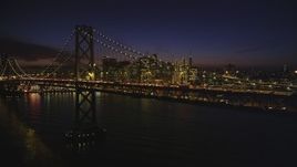 5K Aerial Video of The Bay Bridge and Downtown San Francisco skyline, California, night Aerial Stock Footage | DCSF10_080