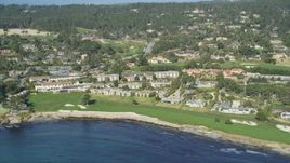 5K Aerial Video Reverse view of Pebble Beach Golf Links and Pebble Beach Resorts, California Aerial Stock Footage | DCSF11_008