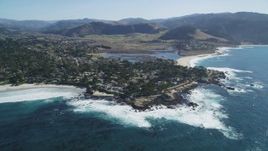 5K Aerial Video Tilt from the ocean to reveal a coastal residential neighborhood in Carmel, California Aerial Stock Footage | DCSF11_009