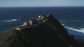 5K Aerial Video Flying by Point Sur Lighthouse buildings atop a coastal cliff, Big Sur, California Aerial Stock Footage | DCSF11_028