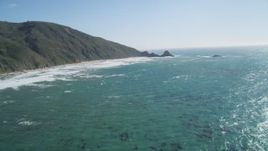 5K Aerial Video Tilt from ocean kelp to reveal steep cliffs, Big Sur, California Aerial Stock Footage | DCSF11_030