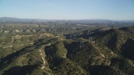 5K Aerial Video Approach power lines atop hills, San Luis Obispo County, California Aerial Stock Footage | DCSF12_002