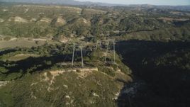5K Aerial Video Following a row of power lines over hills, San Luis Obispo County, California Aerial Stock Footage | DCSF12_003