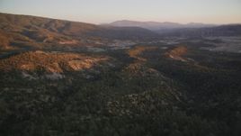5K Aerial Video Fly over wooded hills at sunset, San Luis Obispo County, California Aerial Stock Footage | DCSF12_016