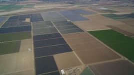5K aerial stock footage of flying by fields of crops, rural landscape, Santa Maria, California Aerial Stock Footage | DFKSF02_011