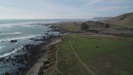 5K aerial stock footage of following the rugged coastline, Estero Bay, California Aerial Stock Footage | DFKSF03_015