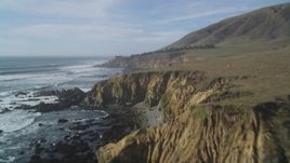 5K aerial stock footage of flying over the jagged coastline's steep cliffs, Cambria, California Aerial Stock Footage | DFKSF03_034