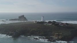 5K aerial stock footage approach and flyby Point Piedras Blancas lighthouse, San Simeon, California Aerial Stock Footage | DFKSF03_072