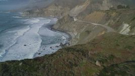 5K aerial stock footage fly over cliffs, revealing Highway 1 coastal road, Big Sur, California Aerial Stock Footage | DFKSF03_097