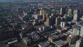 5K aerial stock footage of flying by city buildings around Tribune Tower in Downtown Oakland, California Aerial Stock Footage | DFKSF05_004