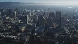 5K aerial stock footage reverse view of federal building and city buildings, Downtown Oakland, California Aerial Stock Footage | DFKSF05_008