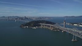 5K aerial stock footage of the Bay Bridge, Yerba Buena Island, and Downtown San Francisco skyline, California Aerial Stock Footage | DFKSF05_010