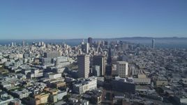 5K aerial stock footage follow Market Street from Civic Center toward Downtown San Francisco skyscrapers, California Aerial Stock Footage | DFKSF05_015