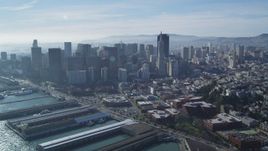 5K aerial stock footage of reverse view of skyscrapers, reveal North Beach and Coit Tower, Downtown San Francisco, California Aerial Stock Footage | DFKSF05_022