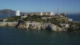 5K aerial stock footage tilt from San Francisco Bay to revealing Alcatraz, San Francisco, California Aerial Stock Footage | DFKSF05_024
