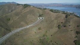 5K aerial stock footage of approaching Robin Williams Tunnel (Waldo Tunnel), Marin Hills, Sausalito, California Aerial Stock Footage | DFKSF05_053