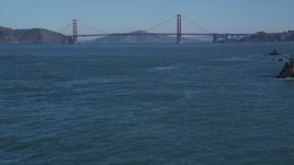5K aerial stock footage of tilting from the ocean to reveal the famous Golden Gate Bridge, San Francisco, California Aerial Stock Footage | DFKSF05_062