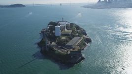 5K aerial stock footage orbit famous Alcatraz, reveal city skyline and Bay Bridge, Downtown San Francisco, California Aerial Stock Footage | DFKSF05_070
