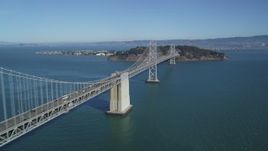 5K aerial stock footage of flying by the Bay Bridge with light traffic, San Francisco, California Aerial Stock Footage | DFKSF05_088
