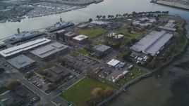 5K aerial stock footage of tilting up from Union Point Park to reveal Coast Guard Island base, Oakland, California Aerial Stock Footage | DFKSF06_006