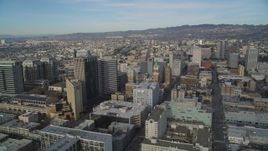 5K aerial stock footage of tilting from the freeway to reveal office buildings in Downtown Oakland, California Aerial Stock Footage | DFKSF06_010