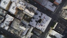 5K aerial stock footage of a bird's eye view of Geary Street and city buildings, Downtown San Francisco, California Aerial Stock Footage | DFKSF06_036