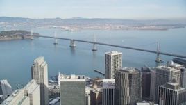 5K aerial stock footage tilt from California Street revealing skyscrapers and Bay Bridge, Downtown San Francisco, California Aerial Stock Footage | DFKSF06_045