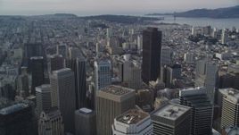 5K aerial stock footage of flying by the city's skyscrapers with the bay in background, Downtown San Francisco, California Aerial Stock Footage | DFKSF06_047